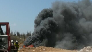 Foto's brand op de landfill