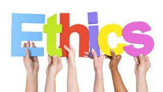 Diverse Hands Holding The Word Ethics