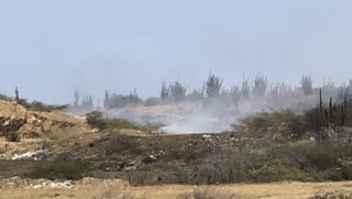 De brand op de vuilnisbelt.